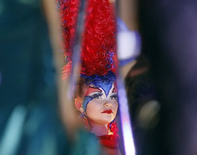 A model presents a hairstyle during the 7th international festival of hairdressing art, fashion and design called “Crystal Angel” in Kiev, April 18, 2013. (Photo by Gleb Garanich/Reuters)