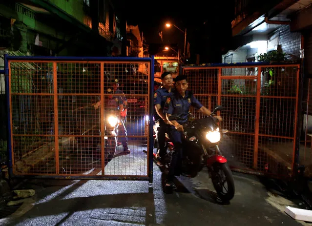 Members of the Philippine National Police (PNP) ride on their motorcycles after an operation on illegal drugs in metro Manila, Philippines, October 13, 2016. (Photo by Romeo Ranoco/Reuters)