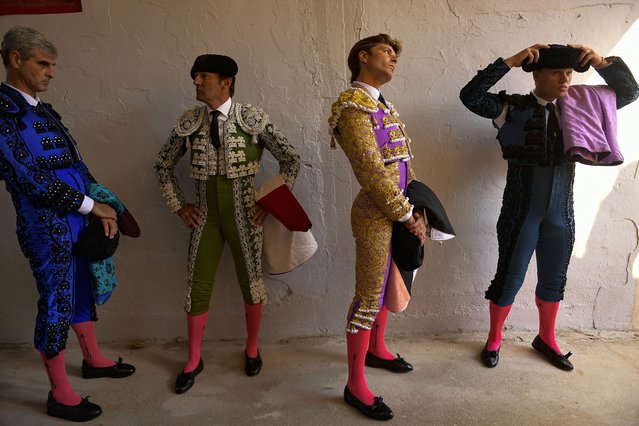 Spanish bullfighter Juan Leal, second right, with his assistants before entering the bullfight at the San Fermín fiesta in Pamplona, Spain, Monday, July 8, 2024. (Photo by Alvaro Barrientos/AP Photo)
