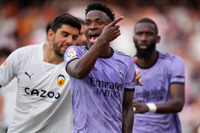 Vinicius Junior of Real Madrid reacts after receiving Racist abuse via gestures made by fans during the LaLiga Santander match between Valencia CF and Real Madrid CF at Estadio Mestalla on May 21, 2023 in Valencia, Spain. (Photo by Aitor Alcalde/Getty Images)