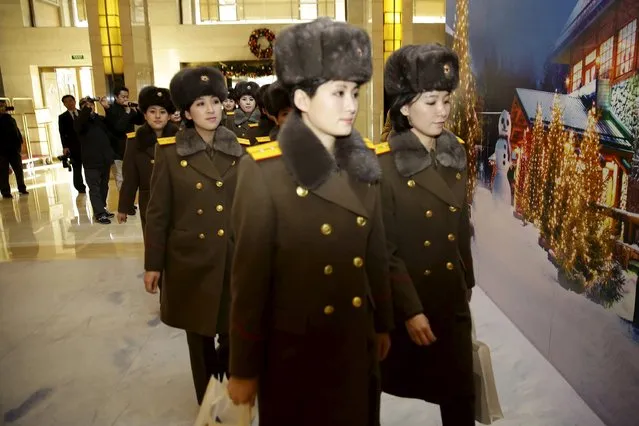 Members of the Moranbong Band from North Korea arrive at a hotel in central Beijing, China, December 11, 2015. (Photo by Reuters/Stringer)
