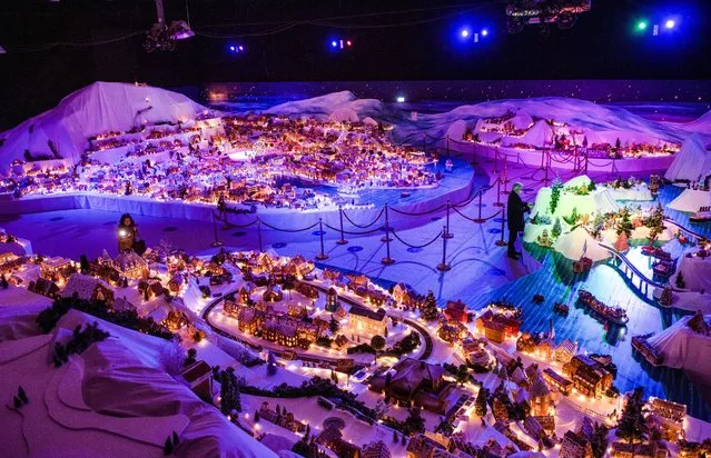 The Gingerbread Town, an annual pre-Christmas tradition consisting of miniature houses, trains, cars and ships, made from gingerbread, is pictured in Bergen, Norway on December 8, 2020. (Photo by Marit Hommedal/NTB via Reuters)