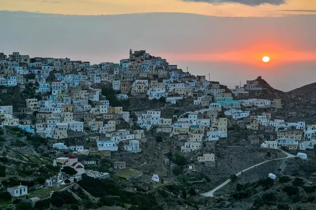 This photograph taken on May 6, 2023 shows the village of Olymbos on the island of Karpathos, the second largest in Dodecanese group after Rhodes. A few days before May 21, 2023's national elections, despair is brewing in the villages of the Greek island of Karpathos, where locals say the central government does little for them. (Photo by Louisa Gouliamaki/AFP Photo)
