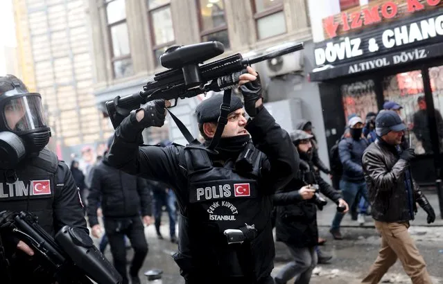 Turkish riot police use rubber pellets to disperse pro-Kurdish demonstrators during a protest against security operations in the Kurdish dominated southeast, in central Istanbul, Turkey January 3, 2016. (Photo by Yagiz Karahan/Reuters)