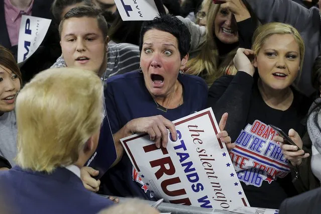 Audience member Robin Roy (C) reacts as U.S. Republican presidential candidate Donald Trump greets her at a campaign rally in Lowell, Massachusetts January 4, 2016. (Photo by Brian Snyder/Reuters)
