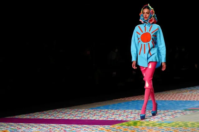 A model displays an outfit created by Agatha Ruiz de la Prada during the Mercedes Benz Fashion Week, amid the coronavirus disease (COVID-19) outbreak in Madrid, Spain, April 9, 2021. (Photo by Sergio Perez/Reuters)