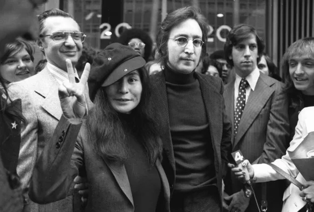 In this April 18, 1972 file photo, John Lennon and his wife, Yoko Ono, leave a U.S. Immigration hearing in New York City. Mark David Chapman, who shot and killed Lennon on Dec. 8, 1980, was denied parole for a tenth time by New York's Parole Board on Thursday, August 23, 2018. He will be up for parole again in August 2020. (Photo by AP Photo)