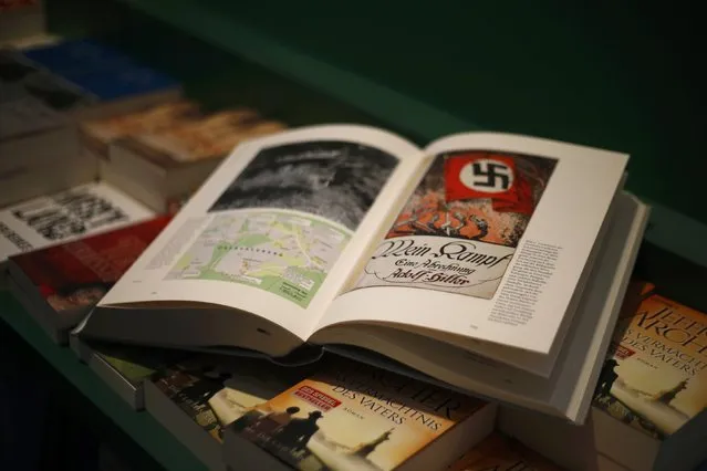 A copy of the book 'Hitler, Mein Kampf. A Critical Edition' lies on a display table in a bookshop in Munich, Germany January 8, 2016. For the first time since Adolf Hitler's death, Germany is publishing the Nazi leader's political treatise 'Mein Kampf' ('My Struggle') unleashing a highly charged row over whether the text is an inflammatory racist diatribe or a useful educational tool. (Photo by Michael Dalder/Reuters)