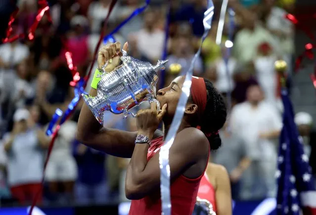 Coco Gauff of the United States celebrates with the trophy after defeating Aryna Sabalenka of Belarus in their Women's Singles Final match on Day Thirteen of the 2023 US Open at the USTA Billie Jean King National Tennis Center on September 09, 2023 in the Flushing neighborhood of the Queens borough of New York City. (Photo by Mike Segar/Reuters)