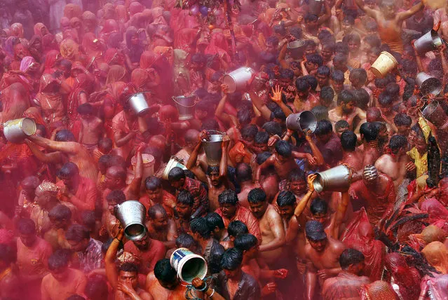 People take part in “Huranga” at Dauji temple near the northern Indian city of Mathura, March 7, 2015. (Photo by Anindito Mukherjee/Reuters)