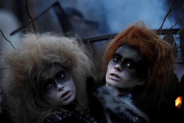 Members of street performance troupe Macnas participate in their Halloween parade called “Out of the Wild Sky” in Galway, Ireland, October 28, 2018. (Photo by Clodagh Kilcoyne/Reuters)