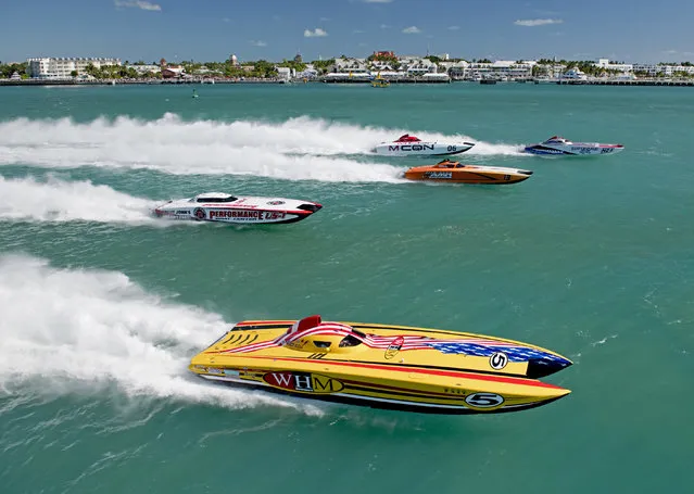 This image courtesy of the Florida Keys News Bureau, WHM Motorsports, piloted by William Mauff and Jay Muller, and other Superboat- class boats cross the start line on November 7, 2018, at the Key West World Championship in Key West, Florida. The event, with additional race days scheduled November 9 and 11, has attracted 39 entries that are divided into seven classes. (Photo by Rob O'Neal/Florida Keys News Bureau via AFP Photo)