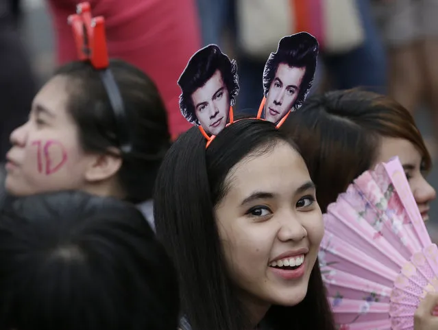 A Filipino fan lines up for the One Direction concert Saturday, March 21, 2015 in the suburban Pasay city south of Manila, Philippines. (Photo by Bullit Marquez/AP Photo)