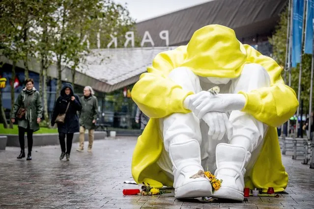 Silent Struggle, a giant statue created by the artist Saskia Stolz, has been put up October 2023 in Rotterdam in the Netherlands to highlight the issues of depression and suicide among young people. (Photo by RUT/Splash News and Pictures)