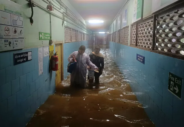 The Tambaram Government Hospital is flooded following heavy rains along the Bay of Bengal coast in  Chennai, India, Monday, December 4, 2023. Authorities issued warnings for tropical storm Michuang, which is likely to hit the southern coast on Tuesday with maximum sustained winds of 90-100 kilometers (56-62 miles) per hour with gusts up to 110 kph (68 mph), the Indian Meteorological Department said. (Photo by AP Photo)