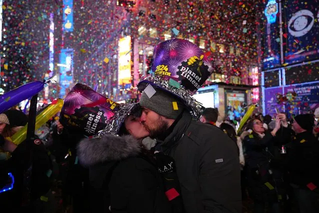 Revelers celebrate New Year's in Times Square on January 01, 2024 in New York City. Around 1 million people are estimated to fill Times Square, alongside a large police presence amid concerns about protests targeting the event. (Photo by Adam Gray/Getty Images)