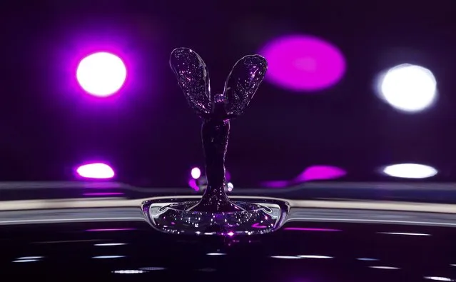 The Spirit of Ecstasy figure is pictured on the bonnet of Rolls Royce Ghost Black Badge car at the 86th International Motor Show in Geneva, Switzerland, March 1, 2016. (Photo by Denis Balibouse/Reuters)