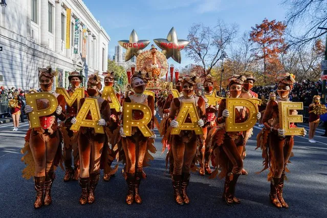 Parade dancers pose before the start of the 95th Macy's Thanksgiving Day Parade in Manhattan, New York City, U.S., November 25, 2021. (Photo by Shannon Stapleton/Reuters)