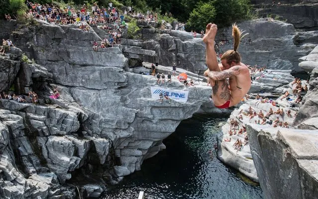 Matthias Appenzeller of Switzerland in action during the International Cliff Diving Championships in the Maggia valley in Ponte Brolla, southern Switzerland, 27 July 2019. (Photo by Samuel Golay/EPA/EFE/Rex Features/Shutterstock)