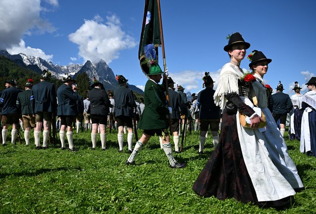 8,500 mountain marksmen meet for the alpine region meeting of shooters from South Tyrol, Tyrol and Bavaria, in Garmisch-Partenkirchen, Germany, on May 26, 2024. (Photo by Angelika Warmuth/Reuters)