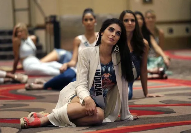 In this Monday, July 6, 2015 photo, Miss Indiana Gretchen Reece listens to instruction during rehearsal for the upcoming Miss USA Pageant, to be held this week in Baton Rouge, La. (Photo by Gerald Herbert/AP Photo)