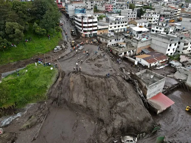 Aerial view of mud after a flood in La Gasca neighborhood, northern Quito, on February 1, 2022. The heaviest flooding to hit Ecuador in two decades has killed at least 18 people in Quito, washing away cars, damaging homes and sweeping away volleyball players and spectators on a sports field, officials said Tuesday. (Photo by Rodrigo Buendia/AFP Photo)