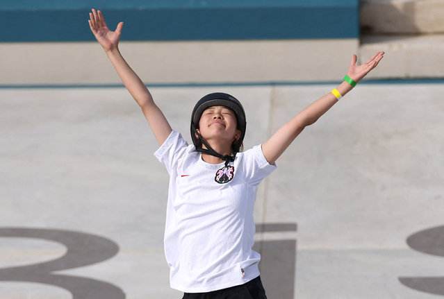 Japan's Coco Yoshizawa celebrates winning the women's street skateboarding final during the Paris 2024 Olympic Games at La Concorde in Paris on July 28, 2024. (Photo by Pilar Olivares/Reuters)