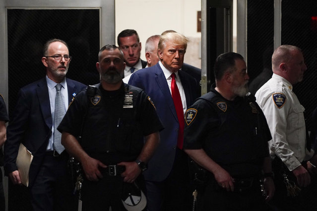 Former president Donald Trump arrives for his court appearance in New York, NY on Tuesday, April 4, 2023. Trump became the first sitting or former U.S. president to be indicted and turned himself to be arraigned in a case that involves payoffs through an intermediary to adult-film actress Stormy Daniels to conceal an alleged affair ahead of the 2016 election. (Photo by Jabin Botsford for The Washington Post)