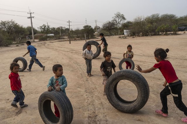 Manjui Indigenous children play in the Abisai community in Mariscal Estigarribia, in the western region of Paraguay known as the Paraguayan Chaco, Wednesday, August 28, 2024. (Photo by Rodrigo Abd/AP Photo)