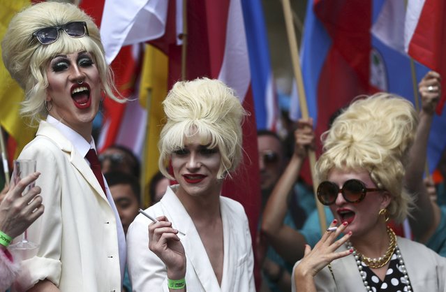 Participants dressed as actress Joanna Lumley take part in the annual Pride London Parade, which highlights issues of the gay, lesbian and transgender community, in London, Britain June 25, 2016. (Photo by Neil Hall/Reuters)