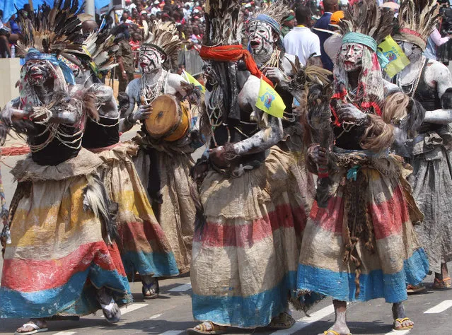 Performers in traditional gear, as people celebrate the Democratic Republic of Congo, DRC, independence from Belgium in Kindu, Congo, Thursday, June 30, 2016. People from the Democratic Republic of Congo celebrated their 56 year of independence from Belgium, with the Congolese President Joseph Kabila attending events in Kindu. (Photo by John Bompengo/AP Photo)