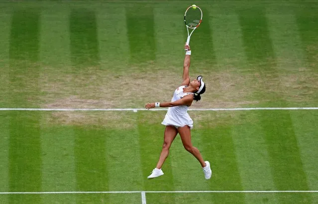 Britain's Heather Watson returns the ball to Germany's Jule Niemeier during their round of 16 women's singles tennis match on the seventh day of the 2022 Wimbledon Championships at The All England Tennis Club in Wimbledon, southwest London, on July 3, 2022. (Photo by Matthew Childs/Reuters)