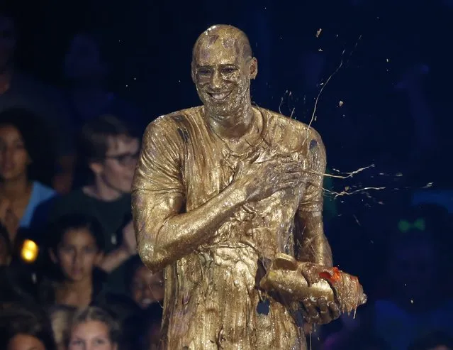 Retired NBA basketball player Kobe Bryant reacts after he was “slimed” after accepting the “Legend” award at the Kids Choice Sport 2016 awards in Los Angeles, California U.S., July 14, 2016. (Photo by Mario Anzuoni/Reuters)