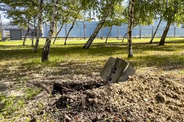 In this handout photo taken from video and released by Russian Defense Ministry Press Service on Sunday, August 7, 2022, A rocket fragment after shelling is seen near the Zaporizhzhia Nuclear Power Station in territory under Russian military control, southeastern Ukraine. The Russian military said that Ukrainian shelling of the Zaporizhzhia nuclear plant on Sunday caused a power surge and fire and forced staff to lower output from two reactors. (Photo by Russian Defense Ministry Press Service via AP Photo)