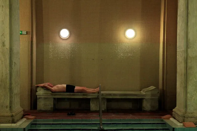 A bather relaxes at the Lukacs Bath in Budapest, Hungary June 23, 2016. (Photo by Bernadett Szabo/Reuters)