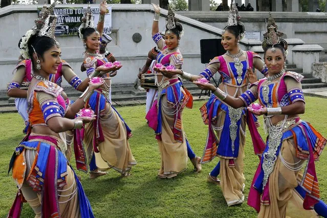 The Sri Lanka Army cultural troupe performing traditional dances at the opening ceremony of the “Tourism Day Walk 2017” organized by students of the Colombo University's tourism study programmes of the Department of Economics in Colombo, Sri Lanka 17 September 2017. (Photo by M.A. Pushpa Kumara/EPA/EFE)