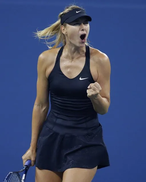 Maria Sharapova of Russia celebrates a point against Sabine Lisicki of Germany in their women's singles match at the 2014 U.S. Open tennis tournament in New York, August 29, 2014. (Photo by Shannon Stapleton/Reuters)
