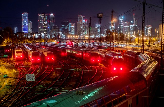 Trains are parked outside a train station in Frankfurt, Germany, Thursday, November 16, 2023, as union representing German train is calling its members out on a 20-hour strike. (Photo by Michael Probst/AP Photo)