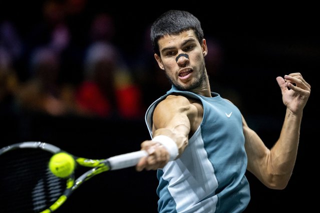 Spain's Carlos Alcaraz plays a forehand return against Italy's Andrea Vavassori on the fourth day of the ATP Tour Rotterdam Open tennis tournament at the Ahoy venue in Rotterdam, on February 6, 2025. (Photo by Sander Koning/ANP via AFP Photo)