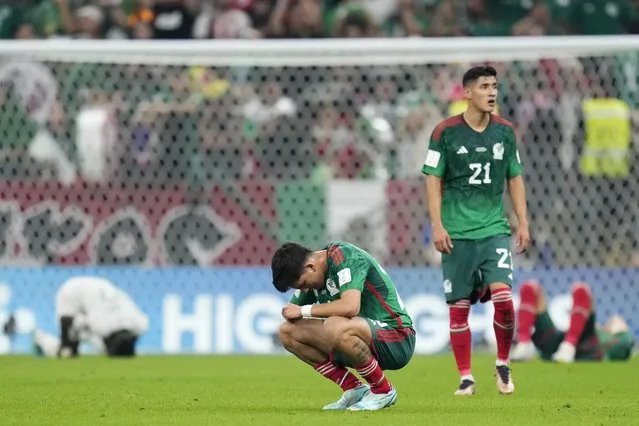 Mexico's Kevin Alvarez retracts after the World Cup group C soccer match between Saudi Arabia and Mexico, at the Lusail Stadium in Lusail, Qatar, Wednesday, November 30, 2022. (Photo by Manu Fernandez/AP Photo)
