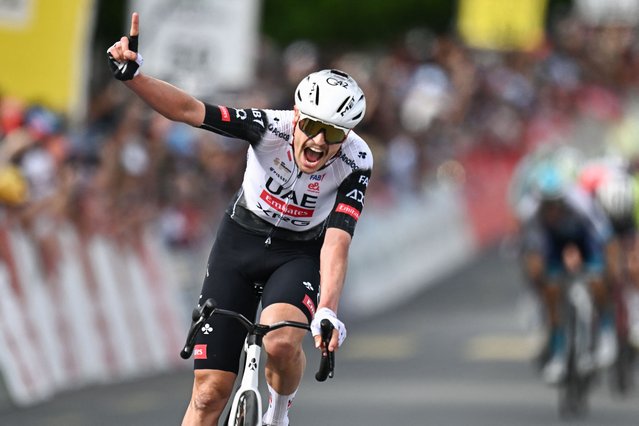 UCI WorldTeam UAE Team Emirates XRG's Australian rider Jay Vine celebrates after crossing the finish line to win the third stage of the Tour of Romandie UCI cycling World tour, 183.1 km loop from the start to the finish in Cossonay, near Vullierens, on May 2, 2025. (Photo by Fabrice Coffrini/AFP Photo)