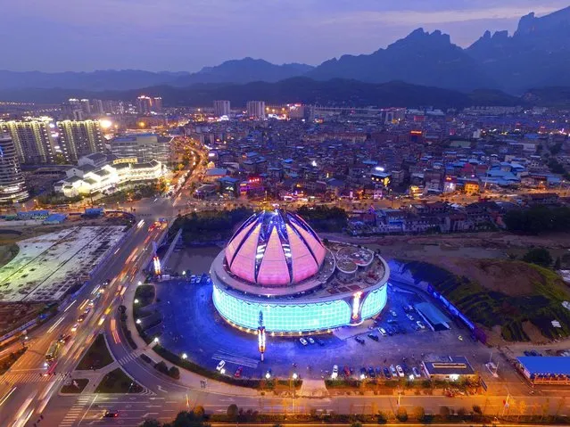 World's largest transparent-domed bar with a lotus-shaped retractable dome is seen in Zhangjiajie, Hunan Province, China, September 7, 2016. (Photo by Reuters/China Stringer Network)