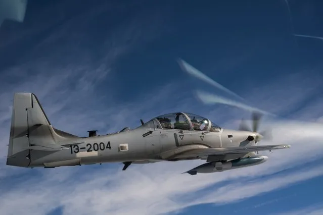 U.S. Air Force Capt. Matthew Clayton, an 81st Fighter Squadron instructor pilot, flies an A-29 Super Tucano in the skies over Moody Air Force Base, Georgia, U.S., March 5, 2015. (Photo by Senior Airman Ryan Callaghan/Reuters/U.S. Air Force)