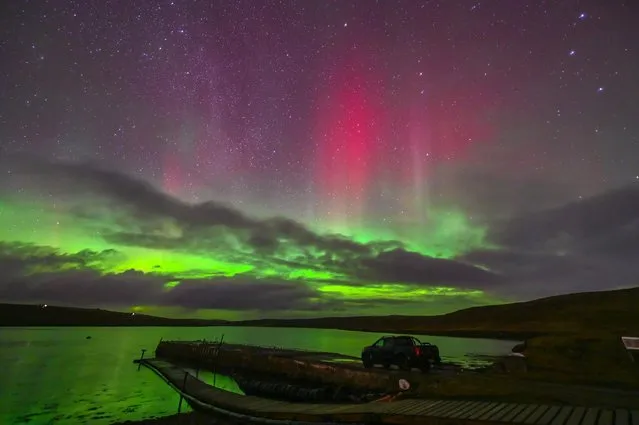 The northern lights as seen from from Yell in the Shetland Islands, Scotland on January 15, 2023. The aurora borealis is caused by collisions between electrically charged particles released from the sun that enter the Earth’s atmosphere and collide with gases such as oxygen and nitrogen. (Photo by Ryan Nisbet/Capture Media Agency)