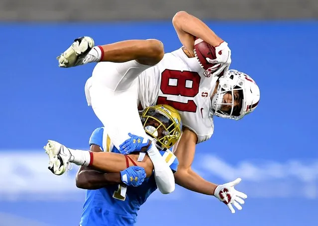 Stanford Cardinal wide receiver Brycen Tremayne (81) is upended by UCLA Bruins defensive back Jay Shaw (1)after catching a pass for a first down at the 37 yard line in the first half of the game against the UCLA Bruins at the Rose Bowl in Pasadena, California, December 19, 2020. (Photo by Jayne Kamin-Oncea/USA TODAY Sports)
