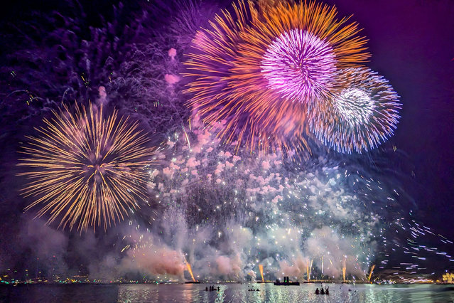 Canada's pyrotechnicians shows off their skills during the Pyrotechnic Art Festival on August 15, 2024 in Cannes, France. Every summer, Cannes hosts in its bay one of the most prestigious Pyrotechnic Art Festivals in the world. The international competition is going on the Croisette for six shows presented by masters of fireworks and the art of synchronisation. These international fireworkers, from Poland, Norway, Italy, Canada, Switzerland and France, are competing for the Silver Vestal price and are using all their creativity to offer carefully organised pyro-musical displays. Each performance on the seafront is acclaimed by more than 100,000 people and a jury of specialists who attend these spectacular jousts. (Photo by Chateau Cyril/ABACA Press/Rex Features/Shutterstock)