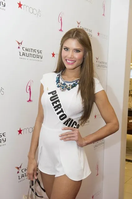 Miss Puerto Rico 2014 Gabriela Berrios poses for photos for the Chinese Laundry shoes meet-and-greet at Macy's in Dadeland Mall in Miami in this January 10, 2015 picture provided by the Miss Universe Organization. (Photo by Reuters/Miss Universe Organization)