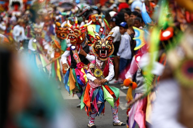 Young people participate in the Great Devil Dance during the folkloric parade that commemorates the 203rd year of Panama's declaration of independence in La Chorrera, Panama 10 November 2024. The Panamanian town of La Chorrera, west of the Panamanian capital, celebrated this sunday with a traditional folklore parade the commemoration of the 203 years of the first declaration of independence of Panama from Spain in 1821. (Photo by Bienvenido Velasco/EPA)