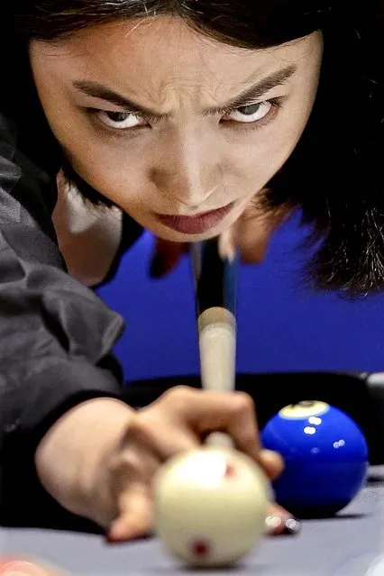 Cha Youram of Korea plays a shot against Chitchomnart Siraphat of Thailand during the Billiards, Women's 10 Ball Single Round of 32 Match at Songdo Convensia on day four of the 4th Asian Indoor & Martial Arts Games  in Incheon, South Korea, on July 2, 2013. (Photo by Chris McGrath/Getty Images)