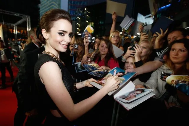 Lily Collins arrives for the “The Mortal Instruments: City of Bones” (Chroniken der Unterwelt) Germany premiere at Sony Centre on August 20, 2013 in Berlin, Germany. (Photo by Andreas Rentz/Getty Images for Constantin Film)